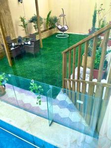 Elegant Apartment - Private Pool & Garden Views