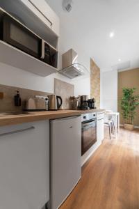 Villa Poe-Tehani - Appartements design - Centre ville : photos des chambres