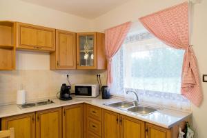 Almafás Jakuzzis Apartmanház Őrség