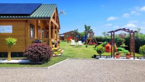 Ferienhaus in Ustronie Morskie mit Grill und Garten