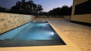 Exklusive Ferienwohnung mit Pool bis 7 Personen nur 60 m vom Strand