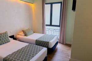 Twin Room with Private Bathroom room in Hostal Charlotte