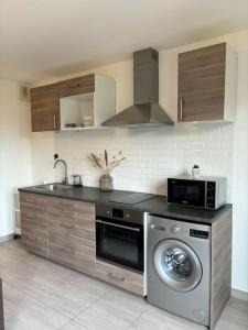 Appartements Duplex Jardin du Lys a 5 min de la gare Melun : photos des chambres