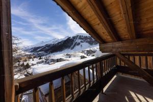 Val d’Isère - Extraordinaire Chalet Montana avec piscine sur la piste Olympique de Belevarde.
