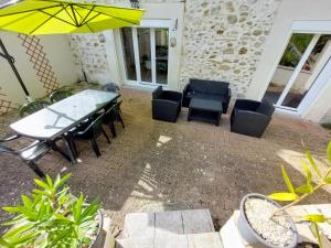 Maisons de vacances Maison spacieuse avec jardin proche Disney : photos des chambres