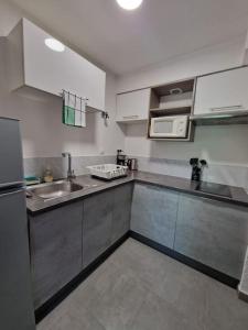 Appartements Rez-de-jardin sous pins et plage : photos des chambres