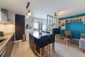 Appartements Le Jean Moulin - Appartement a 2 pas du tramway : photos des chambres