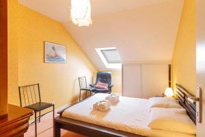 Appartements Appartement en duplex vue sur le port : photos des chambres