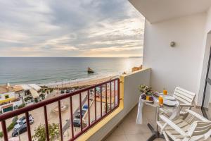 Beachfront 1 BDR Apartment With Pool by LovelyStay