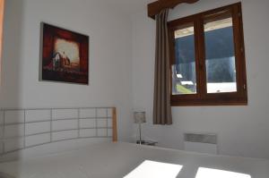 Appartements 3 vallees, piscine et sauna : photos des chambres