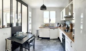 Maisons de vacances Maison de 4 chambres avec jardin clos et wifi a Montlignon : photos des chambres
