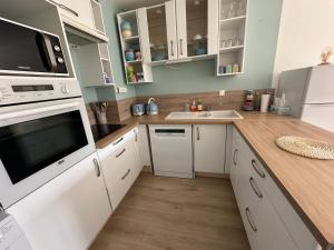 Appartements La garenne, pres des commerces : photos des chambres