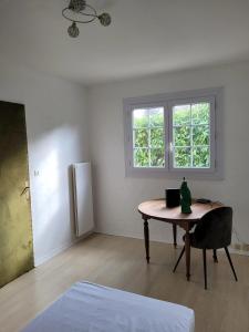 Maisons de vacances Maison de 5 chambres avec jardin clos et wifi a Dammartin en Goele : photos des chambres