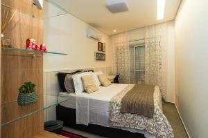 Praia dos Ingleses à 100mt do mar, com varanda e churrasqueira