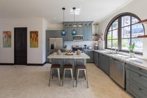 Mediterranean-Style Villa with a Private Plunge Pool, Ocean Views, and Exclusive Beach Club Access