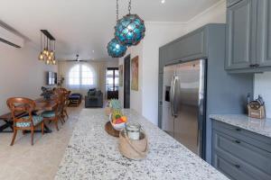 Mediterranean-Style Villa with a Private Plunge Pool, Ocean Views, and Exclusive Beach Club Access