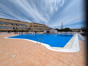 Comfortable 2-Bedroom Duplex in Playa Paraiso with Ocean View, Balcony, and Shared Pool