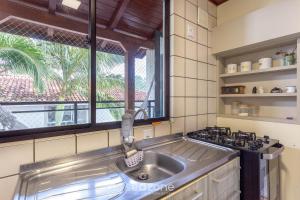 Apto tranquilo a 3min da praia Canasvieiras FML202