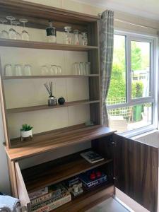 Luxury spacious house with two bathrooms at park with swimming pools, restaurant, bowling, massage & wellness