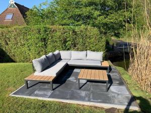 Bungalow in Friesland with Private Spa & Sloop