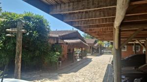 Pousada North Shore Maresias - 2 quadras da praia - Casas de 2 quartos - 80 m2 -2 banheiros -piscina sauna - estacion-churrasq privativa -wifi animais de peq porte roupa de cama e banho