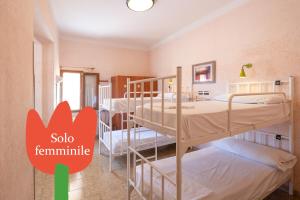 9-Bed Female Dormitory Room