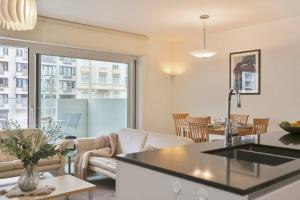 Huswell - Cosy family apartment with parking near the beach