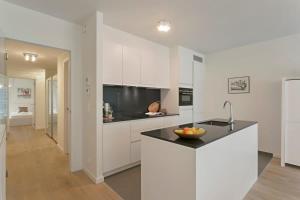 Huswell - Cosy family apartment with parking near the beach