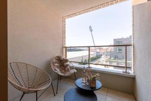 Huswell - Stylish apartment with terrace near the beach