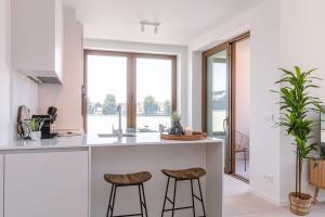 Huswell - Stylish apartment with terrace near the beach