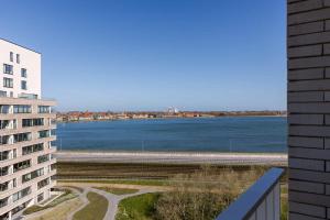 Huswell - Bright apartment with seaview