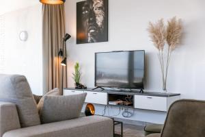 Huswell - Bright apartment with seaview