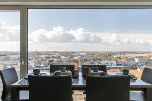 Huswell - Bright apartment with seaview