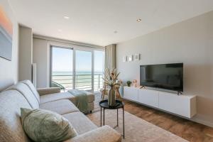 Huswell - Cosy apartment with frontal seaview