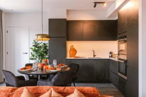 Huswell - Cozy apartment a stones throw from the beach