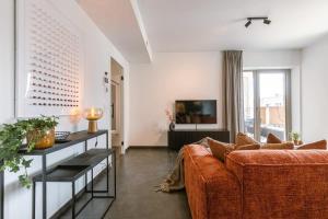 Huswell - Cozy apartment a stones throw from the beach