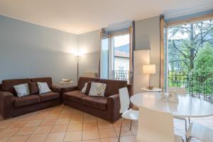 GuestHost - Ossuccio Apt with AC, Balcony & Parking!