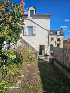 Appartements maison de ville avec jardin privatif : photos des chambres
