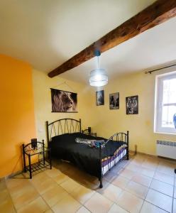 Maisons de vacances Agreable maison de ville avec patio : photos des chambres
