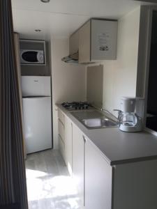 Villages vacances Camping les Fouguieres : photos des chambres
