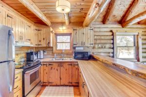 Lakefront Park Rapids Cabin with Decks and Boat Dock!