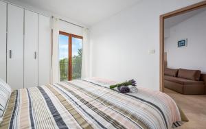 Family-friendly apartments with swimming pool Drenje, Labin - 22999