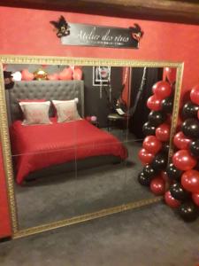 Appartements LOVE ROOM Le rouge et noir : photos des chambres