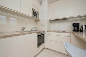 Beautiful Apartment with a Spacious Balcony in Wrocław by Noclegi Renters