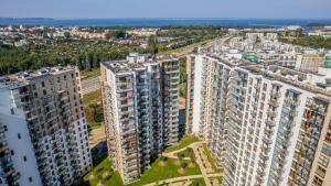 White & Pink Elegant Apartment with Balcony and Parking in Gdańsk