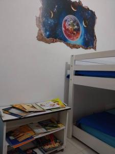 Casa ampla, arejada, muitos jogos e quarto cinema!