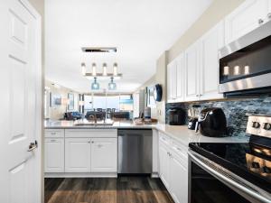 Hidden Dunes Condominium 1406 by Newman-Dailey