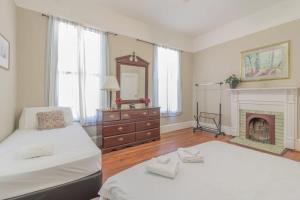 The Sunny Southern Manse Back Walk Downtown