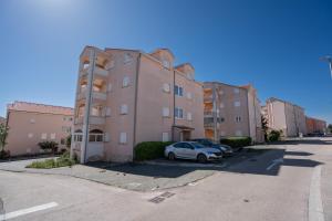 Apartments with a parking space Novalja, Pag - 22146