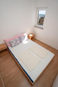 Apartments with a parking space Novalja, Pag - 22146